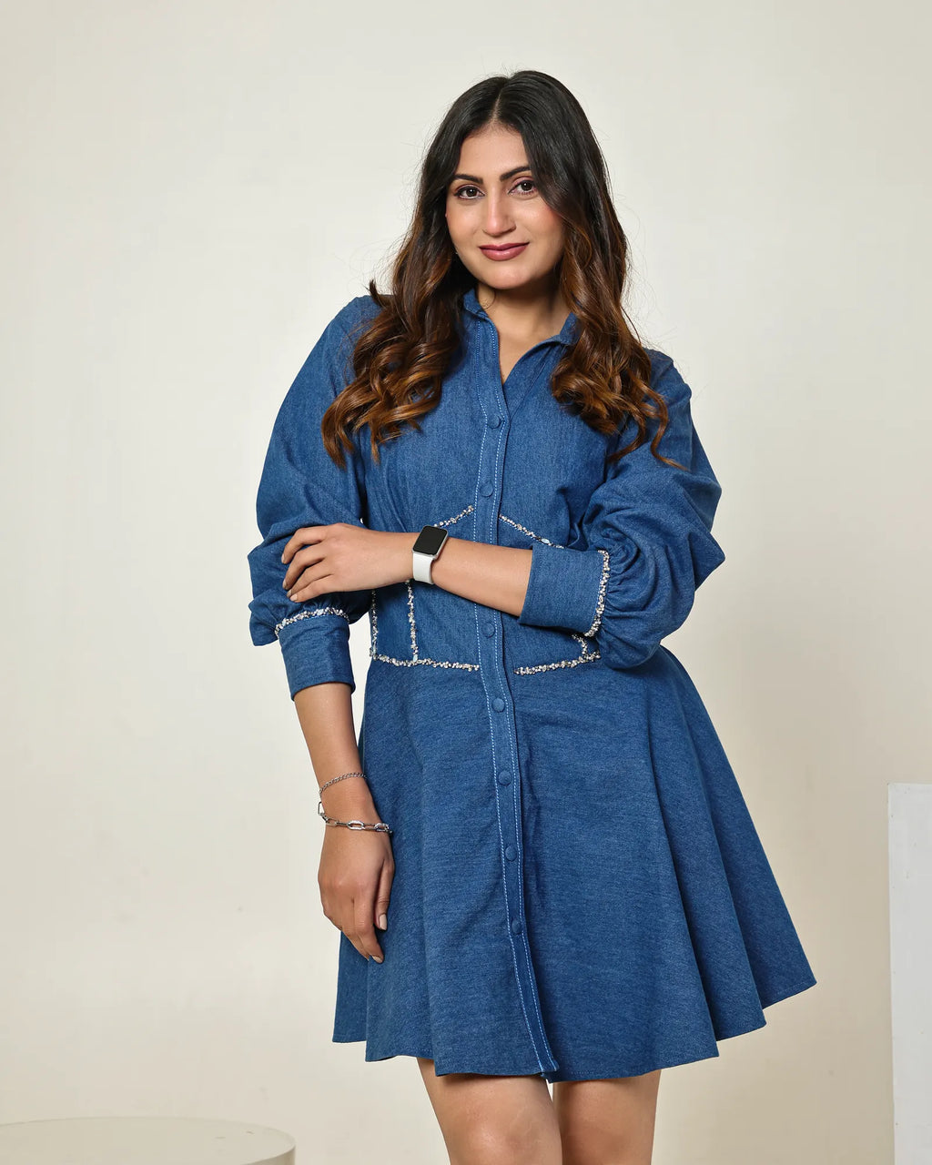 The dark blue denim embellished corset mini dress