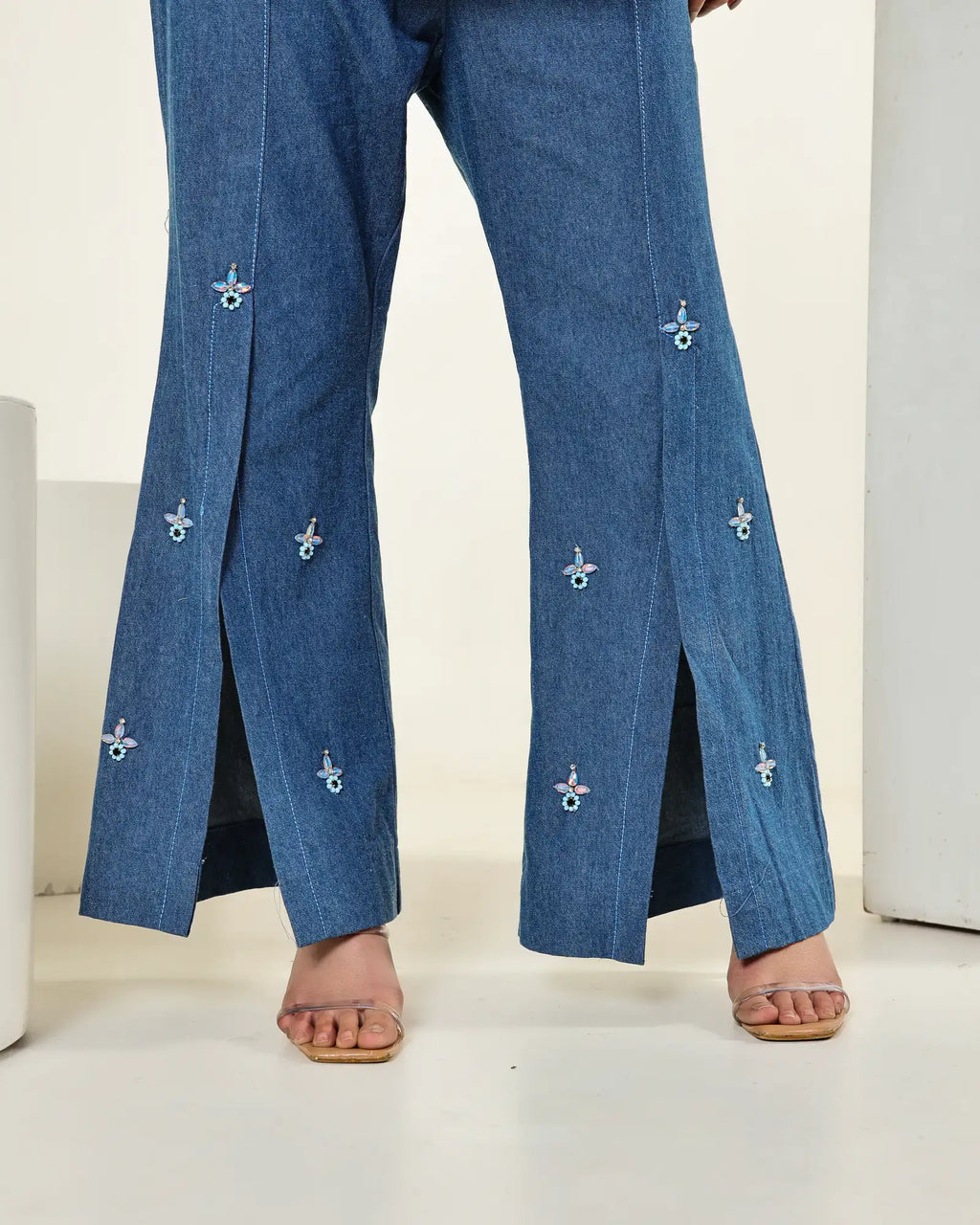 THE DARK DENIM EMBELLISHED PEPLUM FLAP SHIRT WITH HIGH SLIT CUT PANTS