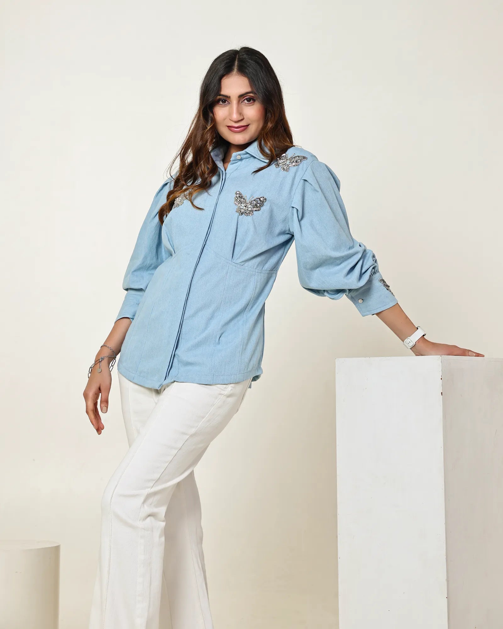 THE LIGHT DENIM BUTTERFLY EMBELLISHED CORSET SHIRT WITH BALLOON SLEEVES