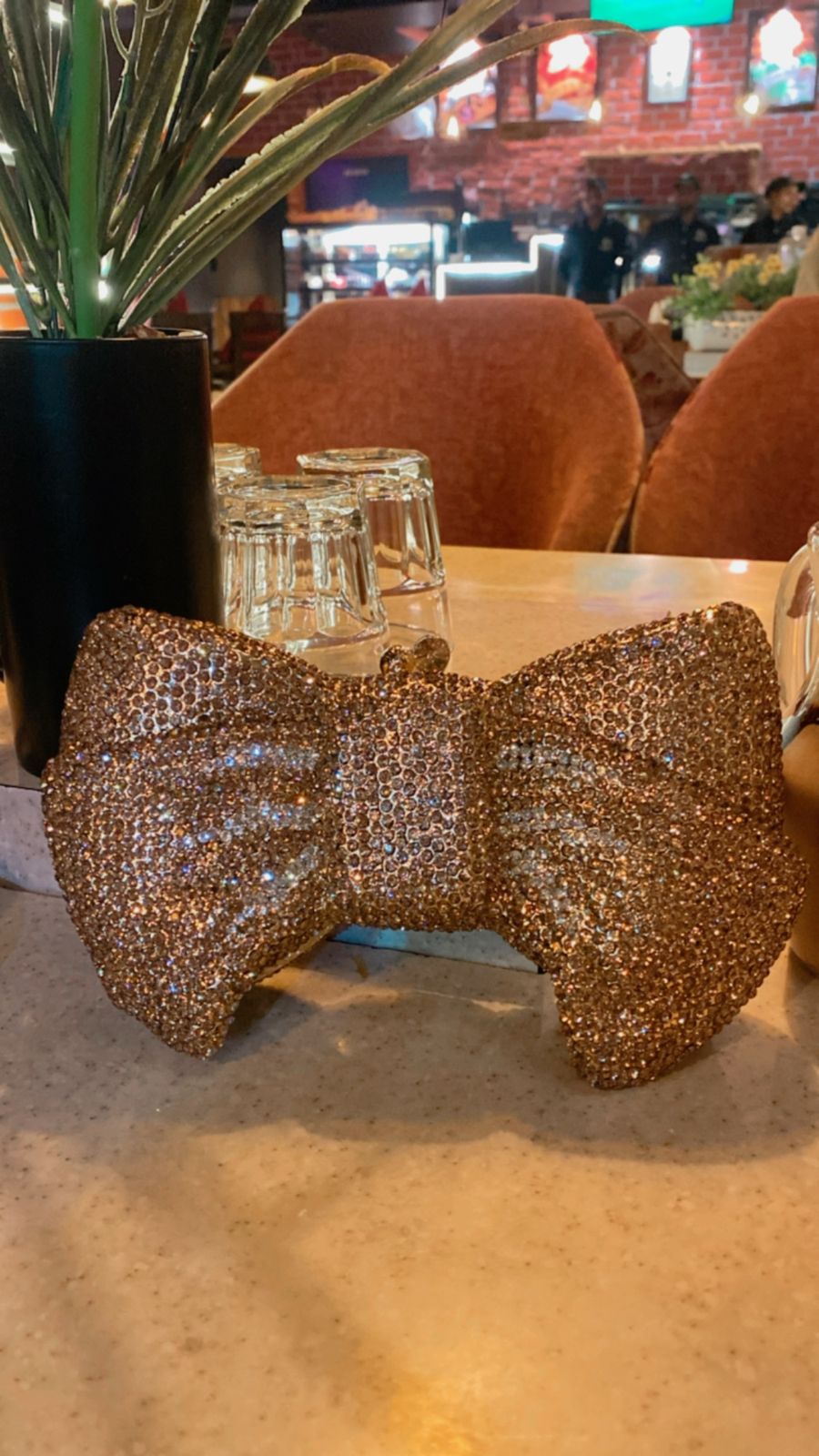 Zoe Golden Bow Clutch