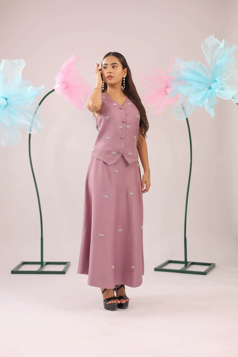 The dirty pink bow vest and skirt set