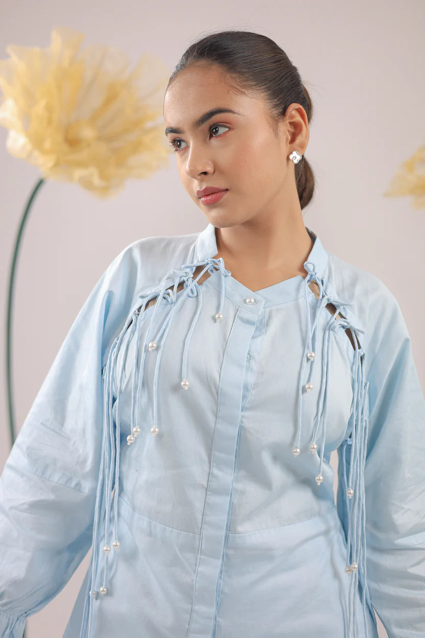 THE SKY BLUE PEARL DROP TASSEL PEPLUM SHIRT