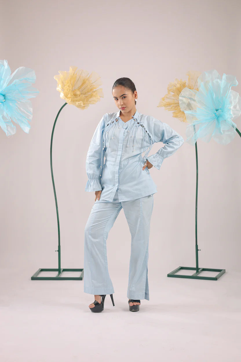 THE SKY BLUE PEARL DROP TASSEL PEPLUM SHIRT