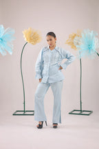 THE SKY BLUE PEARL DROP TASSEL PEPLUM SHIRT