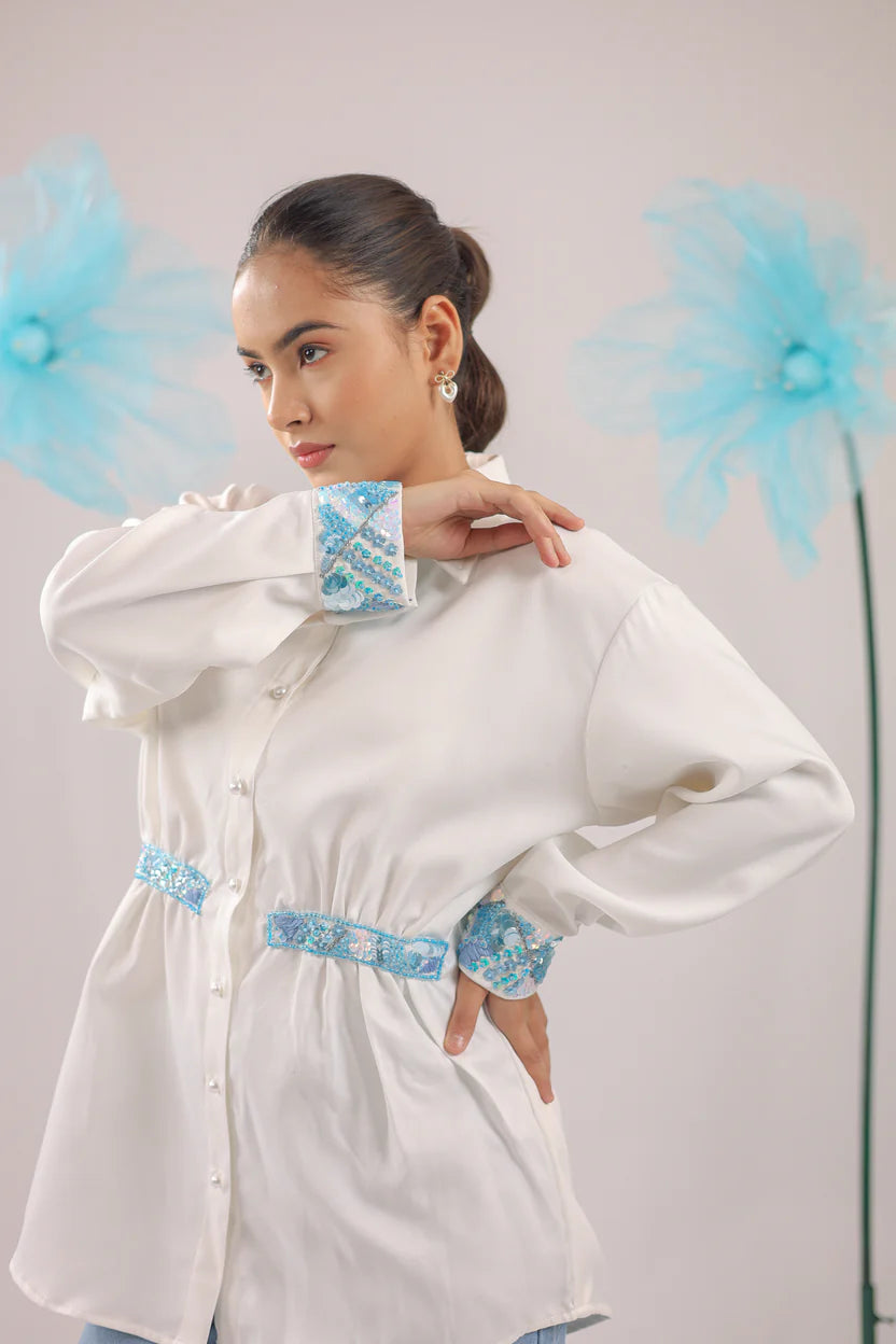 THE WHITE GATHERED CRAPE SHIRT WITH SKY BLUE EMBELLISHMENT