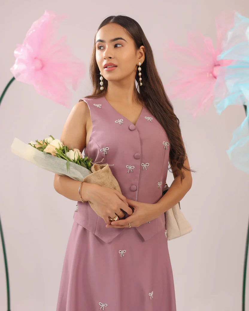 The dirty pink bow vest and skirt set