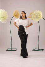 The white and black embellished drape co-ord set