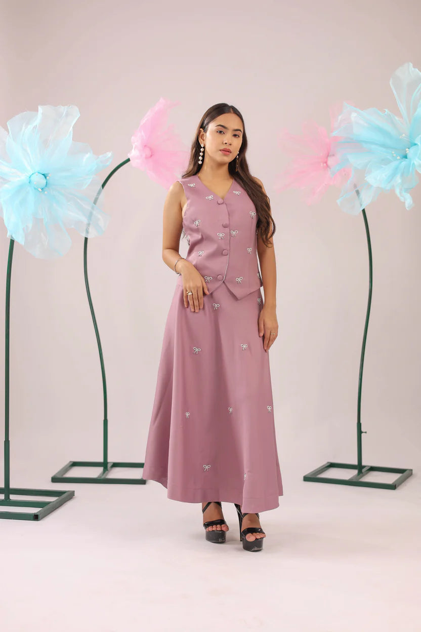 The dirty pink bow vest and skirt set
