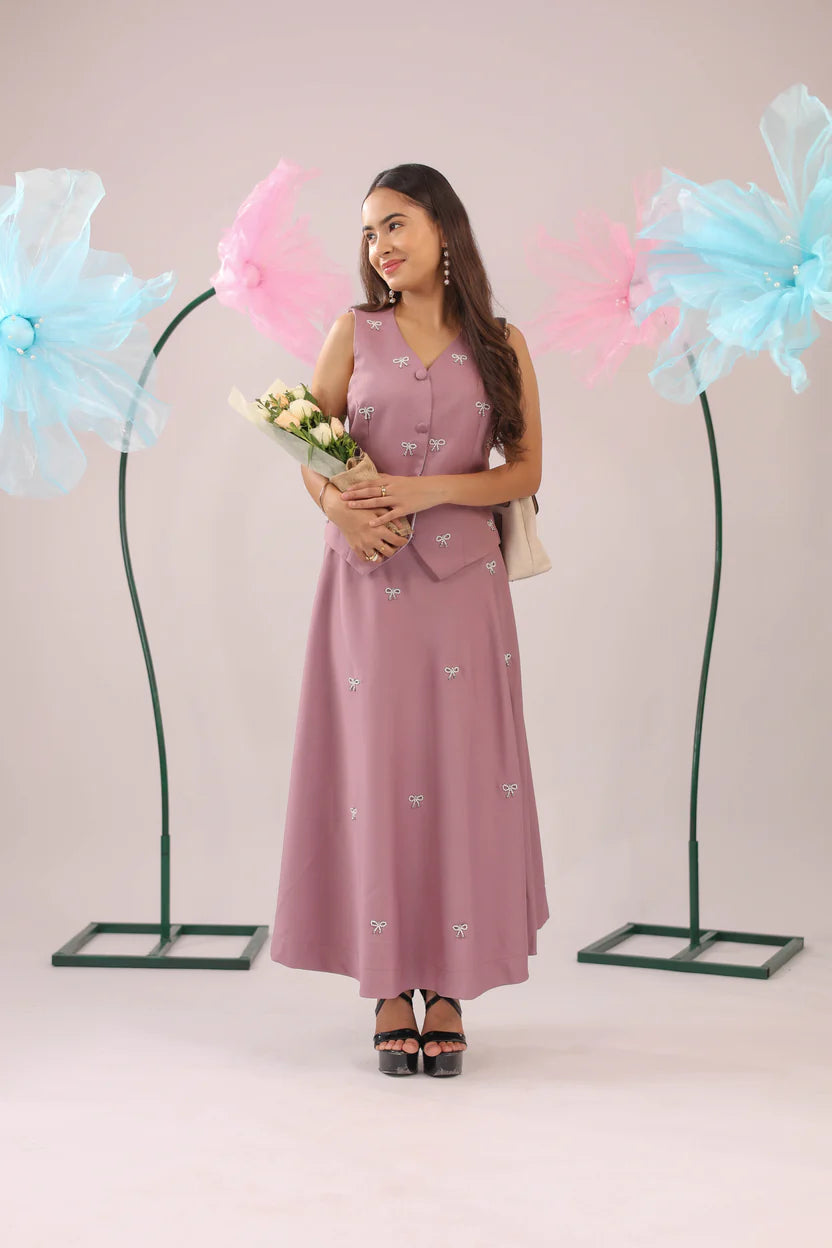 The dirty pink bow vest and skirt set